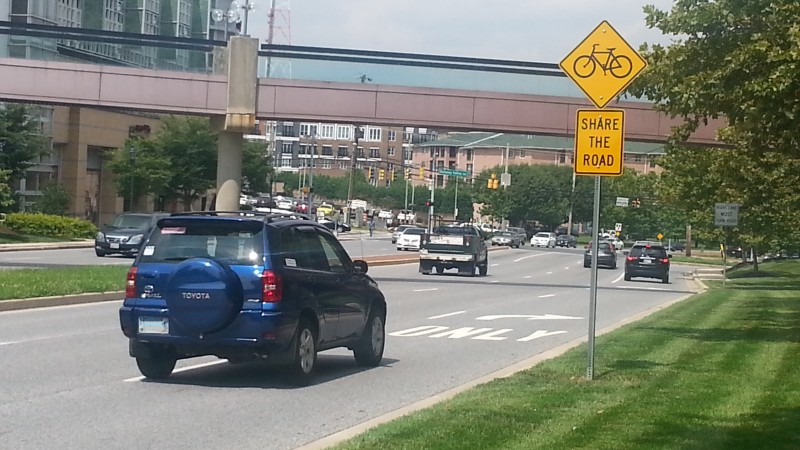 "Share The Road" signs, like this one on Fairmount Avenue, are not enough to encourage safe cycling in Towson.